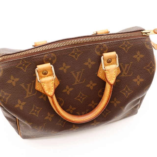 Détail anses et attaches cuir vachette patine caramel Louis Vuitton Speedy 30 — AMANA Vintage
