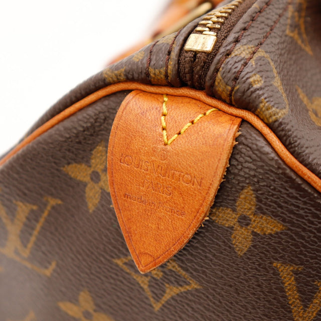 Anse Louis Vuitton Speedy 25 cuir vachette patine caramel detail — AMANA Vintage