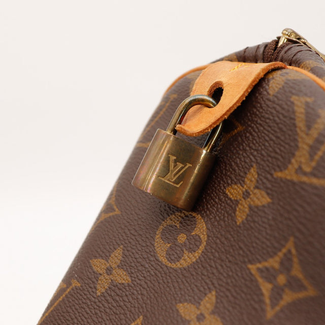 Détail cadenas LV doré Louis Vuitton Speedy 30 occasion — AMANA Vintage