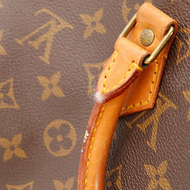 Détail anse et attache cuir vachette Louis Vuitton Speedy 30 usure vernis — AMANA Vintage