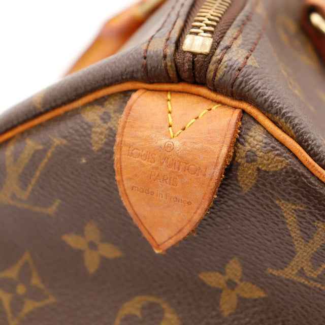 Détail languette Louis Vuitton Speedy 30 made in France — AMANA Vintage