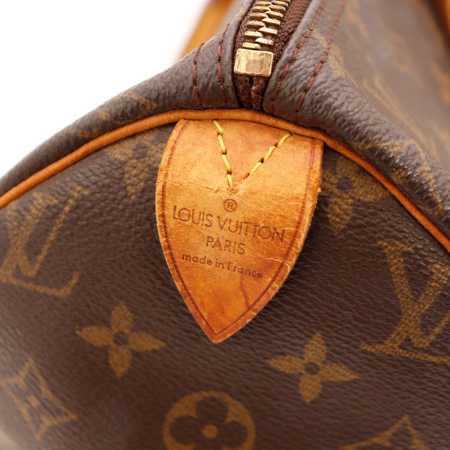 Détail anse et attaches cuir vachette Louis Vuitton Speedy 40 occasion — AMANA Vintage