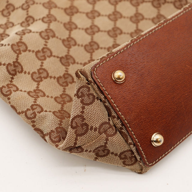 Détail coin inférieur Tote Bag Bambou Gucci cuir marron état — AMANA Vintage