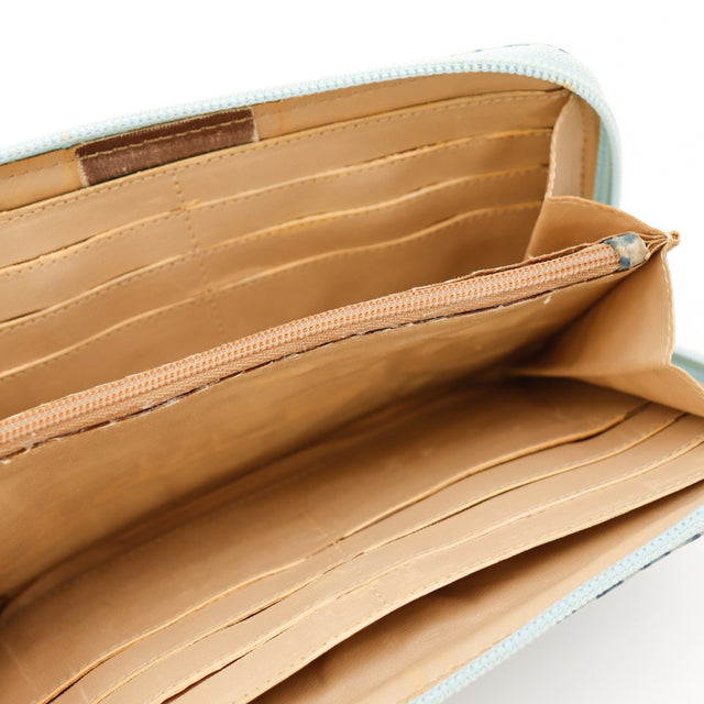 Intérieur portefeuille Louis Vuitton Zippy léopard bleu doublure camel — AMANA Vintage