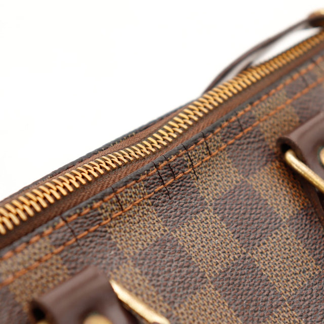 Détail toile Damier Ébène et zip Louis Vuitton Speedy 25 — AMANA Vintage