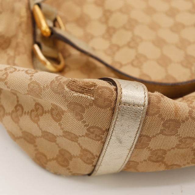 Détail défaut effilochage toile Hobo Gucci près attache anse — AMANA Vintage