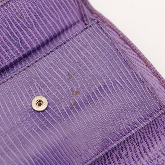 Détail intérieur poche centrale portefeuille Courrèges violet — AMANA Vintage