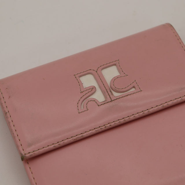 Détail logo RC Courrèges cuir lisse rose virage couleur taches visible — AMANA Vintage