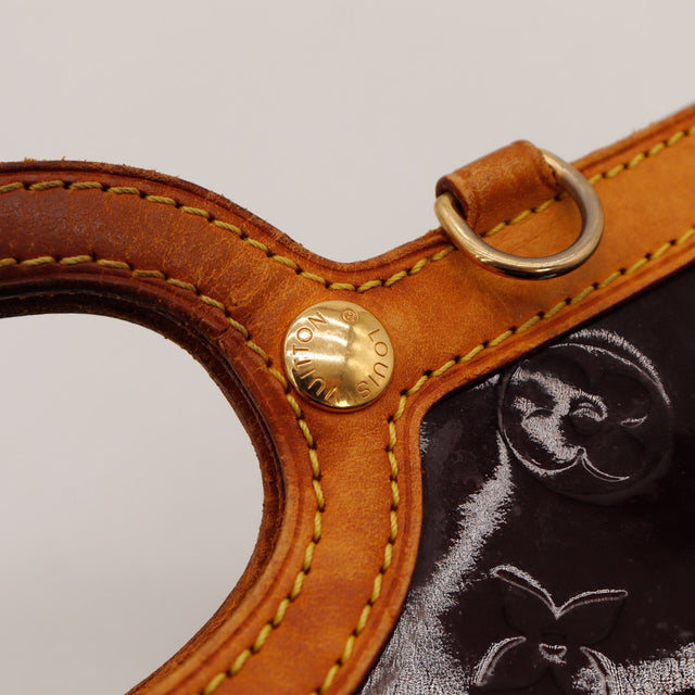 Détail poignée anneau cuir vachette Louis Vuitton Roxbury Drive amarante — AMANA Vintage