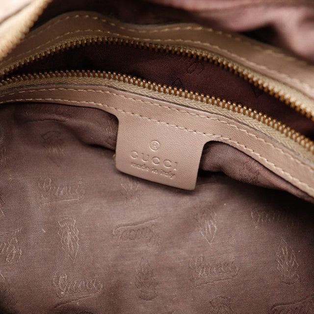 Détail revers anse Gucci Hobo Guccissima avec signature Gucci embossée — AMANA Vintage
