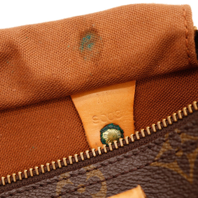 Détail intérieur Louis Vuitton Speedy 25 taches encre doublure — AMANA Vintage