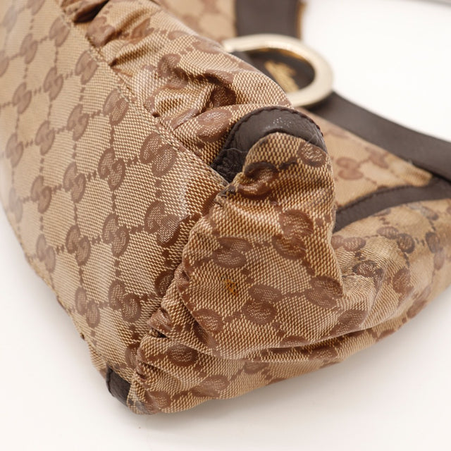 Detail toile monogrammée Gucci Hobo D-Ring occasion authentique — AMANA Vintage
