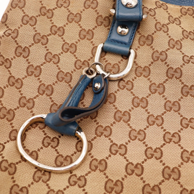 Vue de dos Gucci Tote toile monogrammée beige occasion authentique — AMANA Vintage
