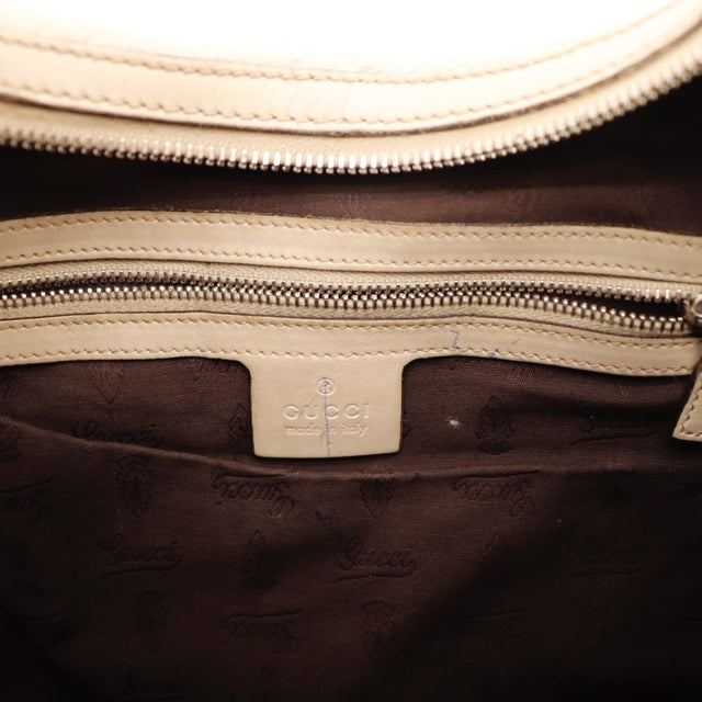 Détail cuir embossé motif GG Gucci Twins Hobo — AMANA Vintage