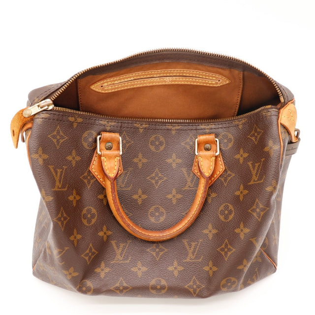 Détail des anses Louis Vuitton Speedy 30 Toile Monogramme occasion authentique — AMANA Vintage