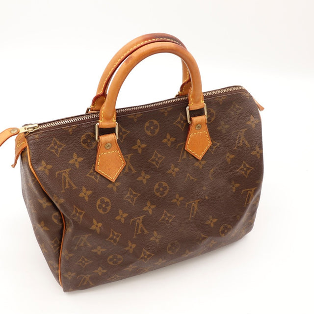 Détail de l'argenterie Louis Vuitton Speedy 25 Toile Monogramme occasion authentique — AMANA Vintage