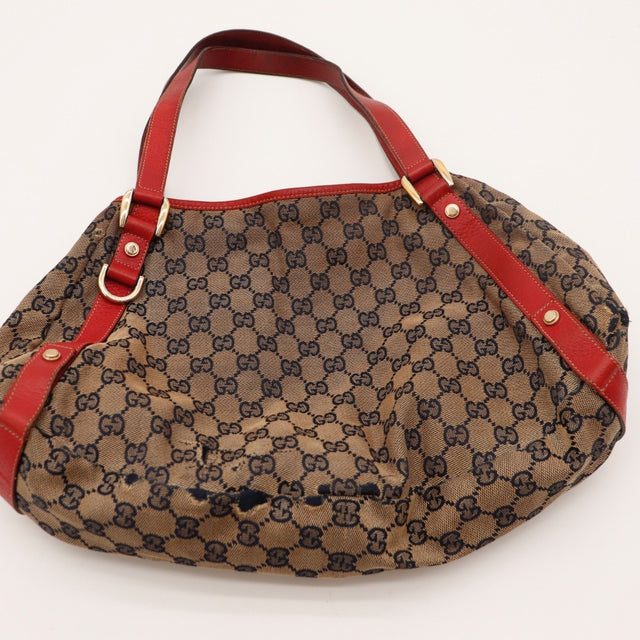 Détail fond Gucci Abbey D-Ring toile GG occasion authentique — AMANA Vintage