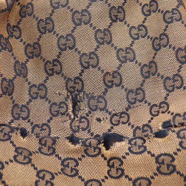 Vue de dos Gucci Abbey D-Ring toile GG bicolore occasion authentique — AMANA Vintage