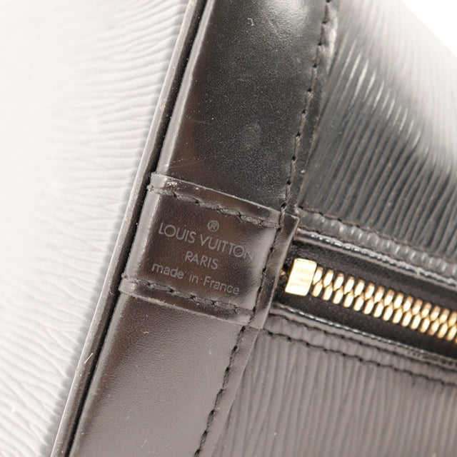 Vue de côté Louis Vuitton Alma PM cuir Épi noir occasion authentique — AMANA Vintage