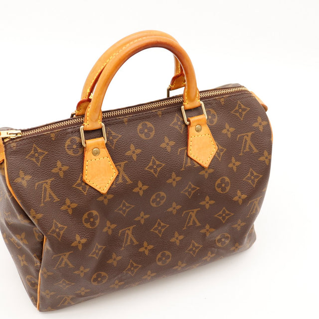 Vue trois quarts avant Louis Vuitton Speedy 30 anses vachette patine caramel — AMANA Vintage