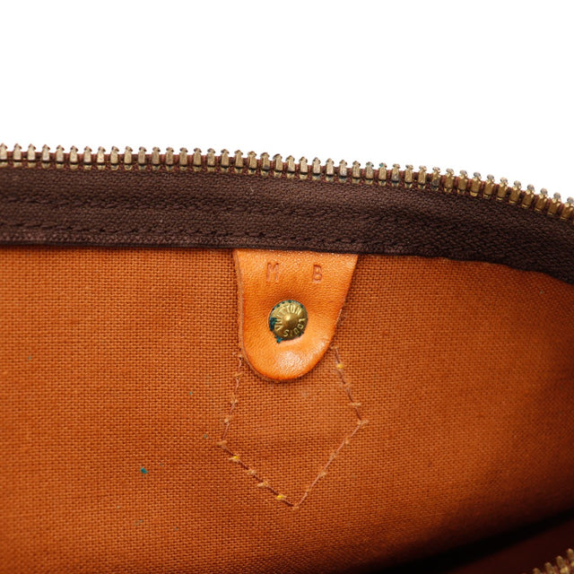 Détail intérieur Louis Vuitton Speedy 35 languette vachette initiales MB — AMANA Vintage