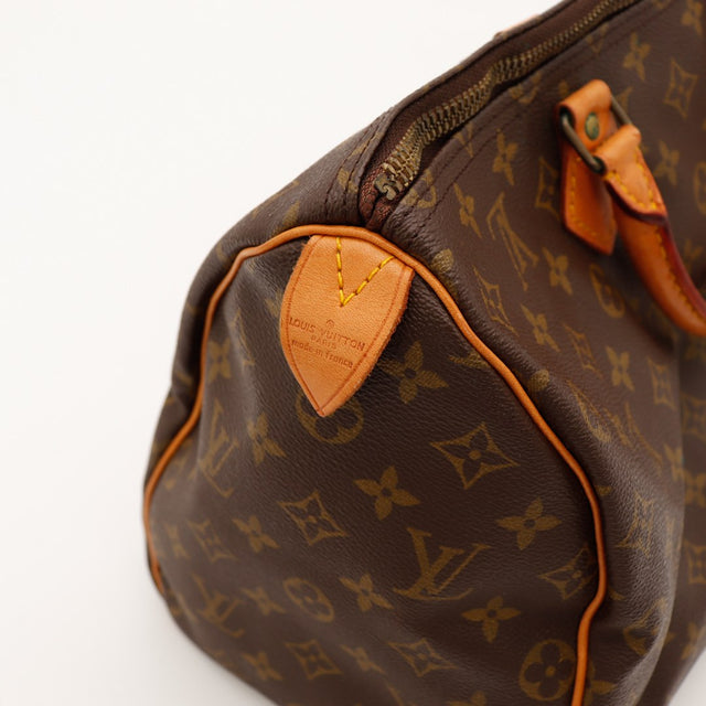 Détail languette tab Louis Vuitton Speedy 35 estampillé made in France — AMANA Vintage