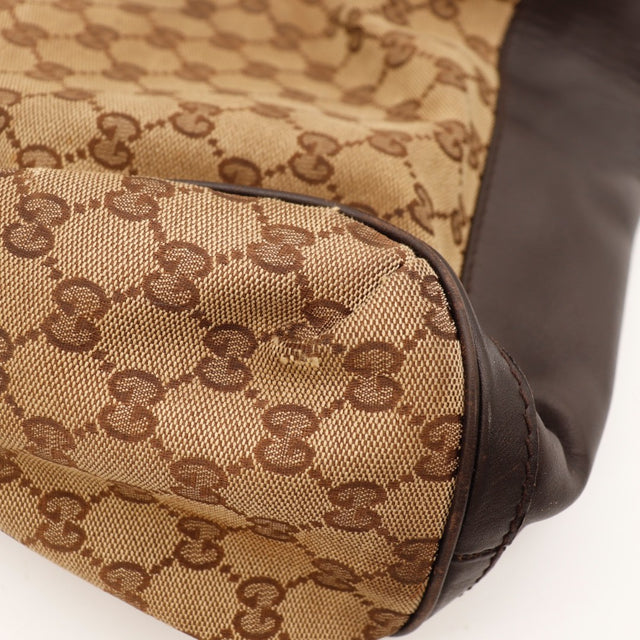 Vue de dos Gucci Hobo Scarlett toile beige occasion authentique — AMANA Vintage