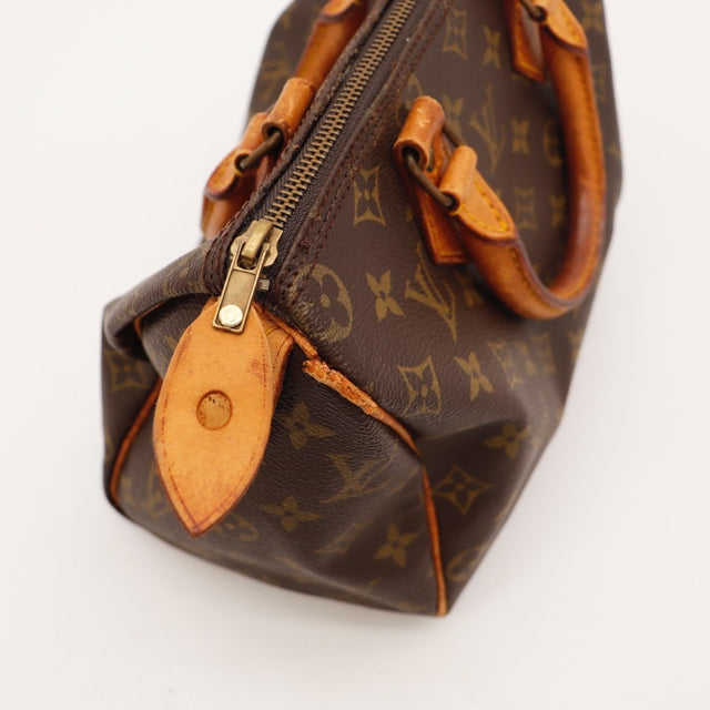 Détail de la fermeture Louis Vuitton Speedy 25 Toile Monogramme occasion authentique — AMANA Vintage