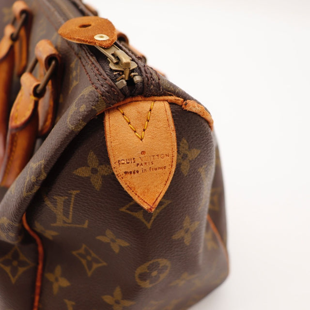 Détail de l'argenterie Louis Vuitton Speedy 25 Toile Monogramme occasion authentique — AMANA Vintage