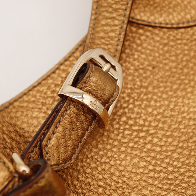 Vue de dessous Gucci Hobo Horsebit cuir métallisé cuivre — AMANA Vintage