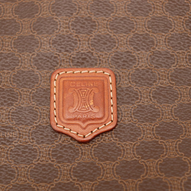 Detail medaillon cuir Celine Paris sur toile Macadam marron — AMANA Vintage