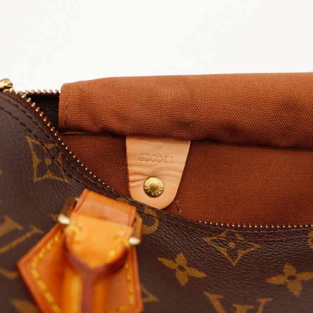Détail coin et zip Louis Vuitton Speedy 25 tirette cuir vachette — AMANA Vintage