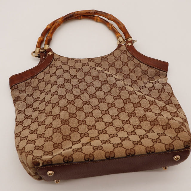 Vue de côté Gucci Tote Bag Bambou toile monogrammée beige occasion authentique — AMANA Vintage