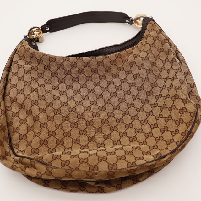 Détail coins inférieurs Gucci Twins Hobo toile GG — AMANA Vintage