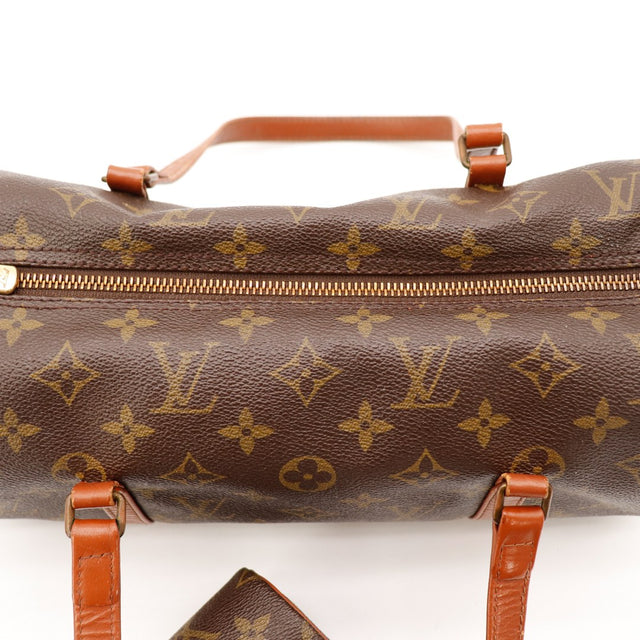 Detail disque lateral Louis Vuitton Papillon 30 cuir vachette patine occasion — AMANA Vintage