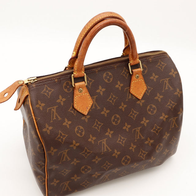 Louis Vuitton Speedy 30 vue trois quarts angle droit anses vachette caramel — AMANA Vintage