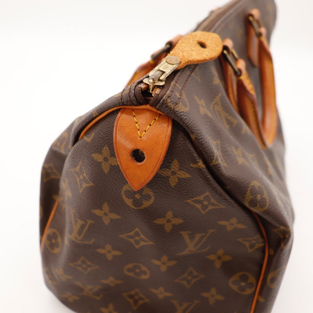 Détail du date code Louis Vuitton Speedy 35 Toile Monogramme occasion authentique — AMANA Vintage
