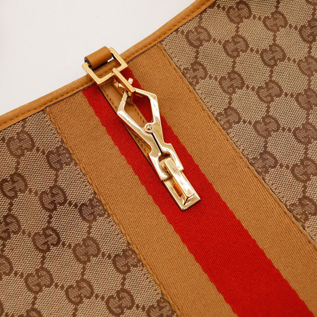 Détail intérieur de l'anse sac Gucci Jackie Web, traces de contact visibles — AMANA Vintage