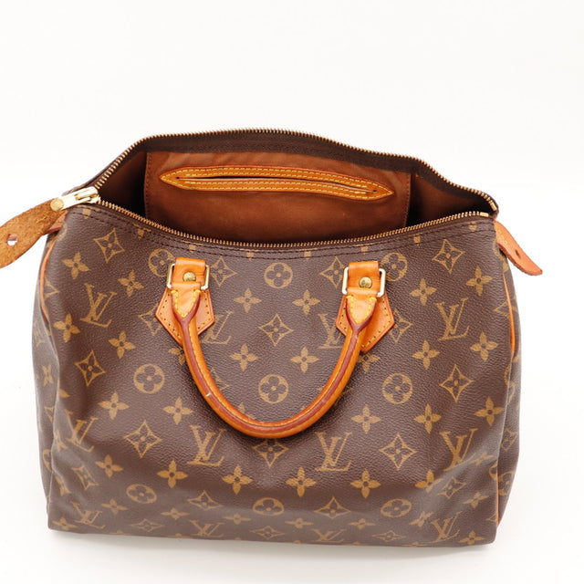 Détail date code SD0959 et tache doublure Louis Vuitton Speedy 30 — AMANA Vintage