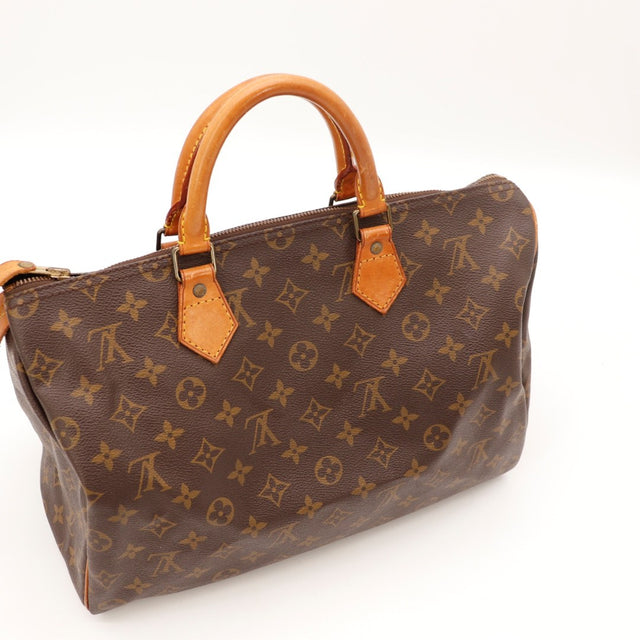 Détail de l'argenterie Louis Vuitton Speedy 35 Toile Monogramme occasion authentique — AMANA Vintage