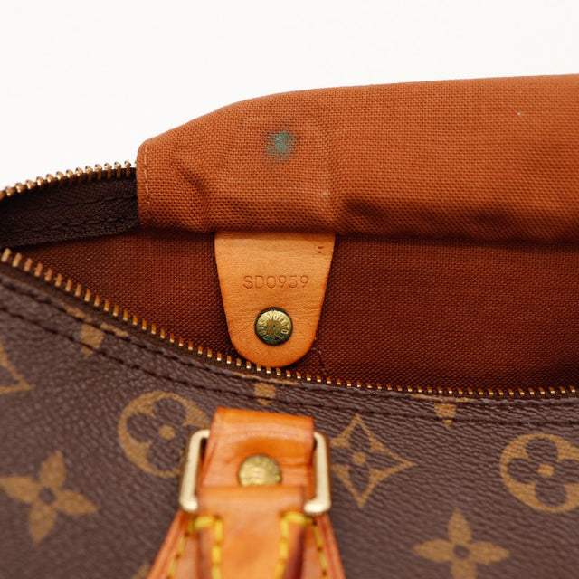 Détail tirette en cuir et zip Louis Vuitton Speedy 30 — AMANA Vintage