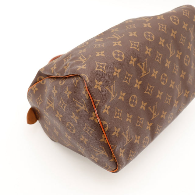 Vue fond bas Louis Vuitton Speedy 30 toile monogramme coins — AMANA Vintage
