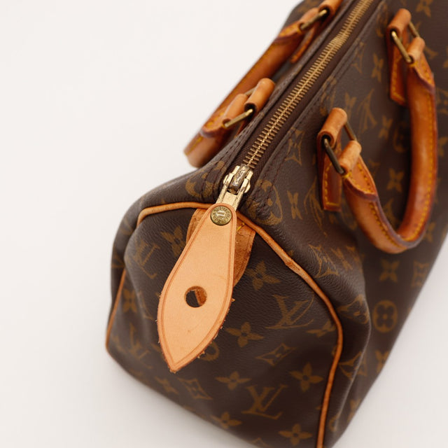 Détail attaches anses et zip Louis Vuitton Speedy 25 — AMANA Vintage