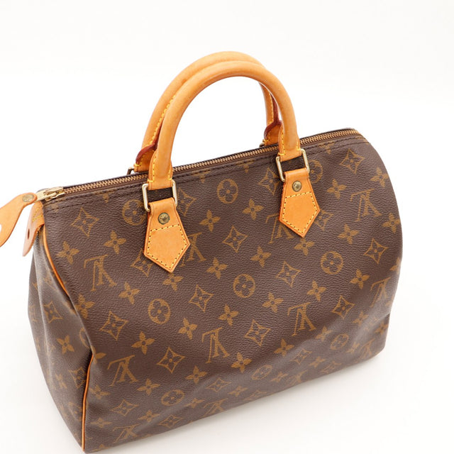 Détail tab Louis Vuitton Speedy 30 estampe Louis Vuitton Paris — AMANA Vintage