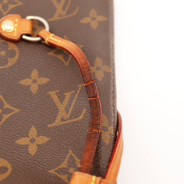 Détail argenterie dorée Louis Vuitton Neverfull MM — AMANA Vintage