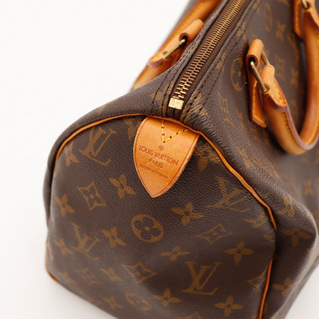Vue angle Louis Vuitton Speedy 30 anses vachette patine caramel — AMANA Vintage