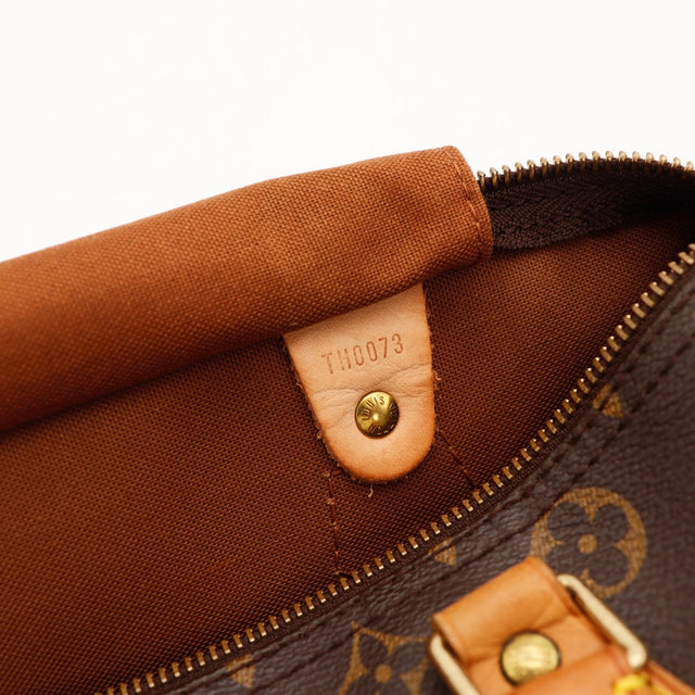 Date code TH0073 Louis Vuitton Speedy 30 languette cuir intérieur — AMANA Vintage