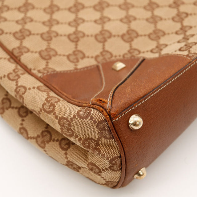 Detail coin inferieur Gucci New Jackie frottements cuir marron — AMANA Vintage