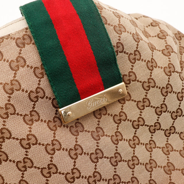Detail ruban Web Gucci vert rouge et plaque argentee Gucci sur Hobo — AMANA Vintage