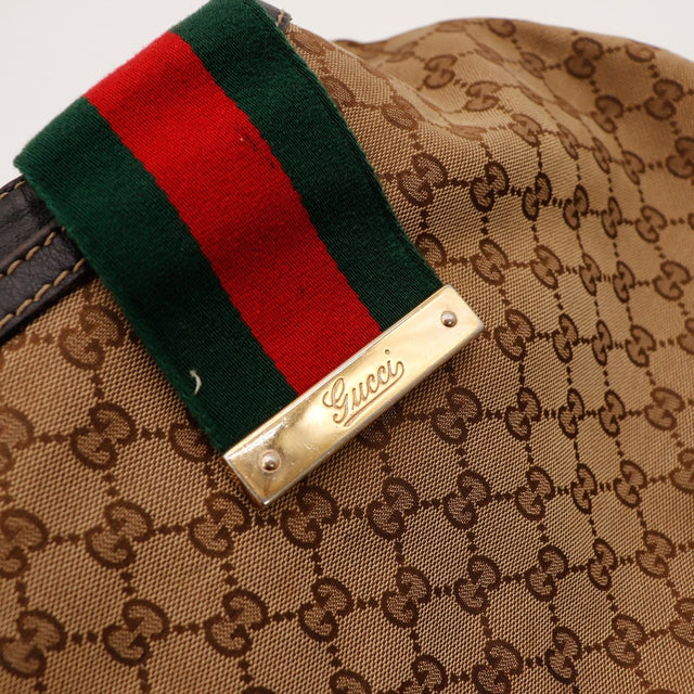 Détail bande Web et plaque Gucci dorée occasion authentique — AMANA Vintage